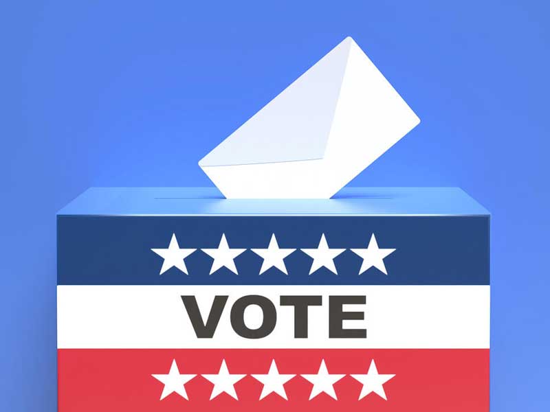 voting box with a ballot going inside it